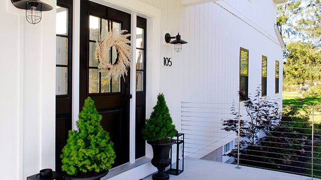 Exterior photograph of a modern farmhouse in Waterford, Connecticut